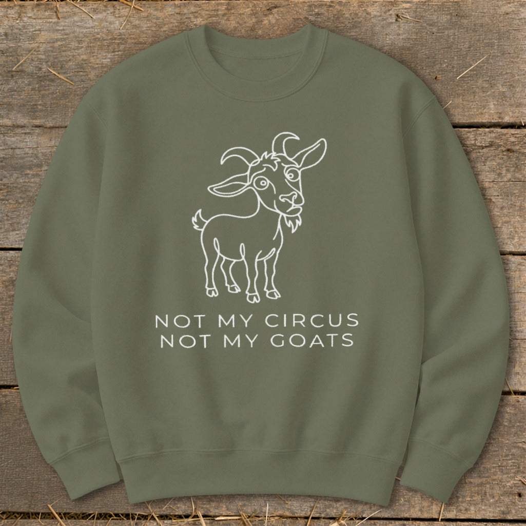 Olive green sweatshirt with white line drawing of a goat and text.