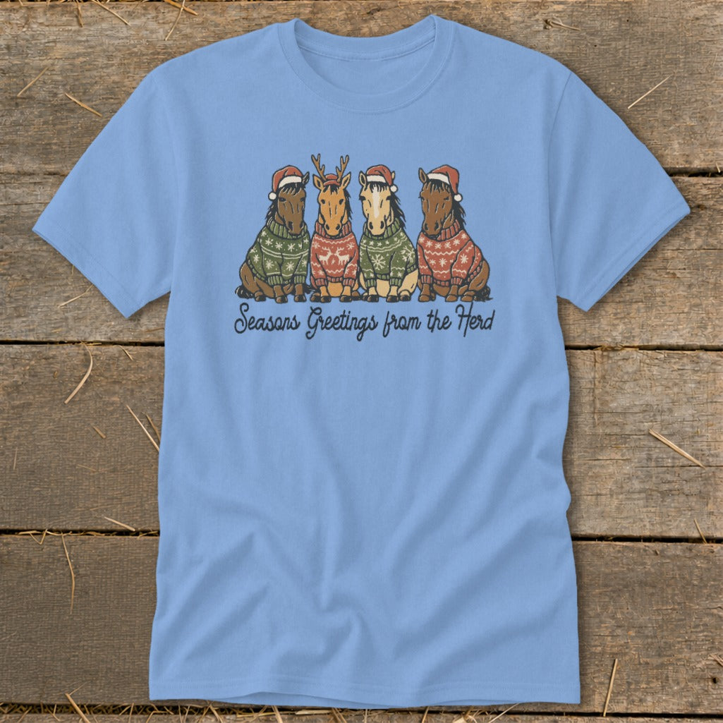 Four horses in sweaters and Santa hats with "Seasons Greetings from the Herd" text.