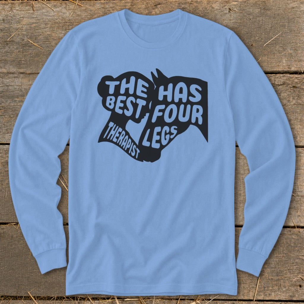 Light blue long sleeve shirt with black graphic text "THE HAS BEST FOUR THERAPIST LEGS".