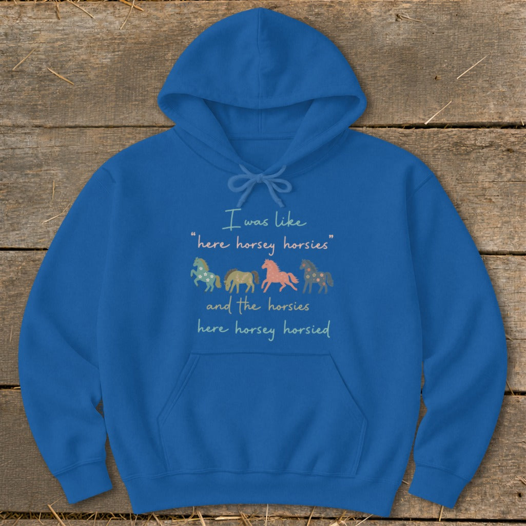 Blue hoodie with text and stylized horse graphics.