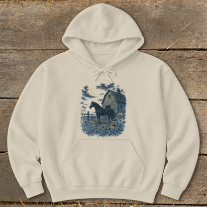 Cream hoodie with a graphic of a black horse and barn under a crescent moon.