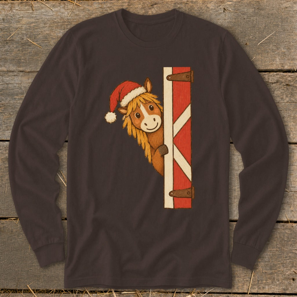Brown long-sleeve shirt with a cartoon horse wearing a Santa hat peeking from behind a barn door.