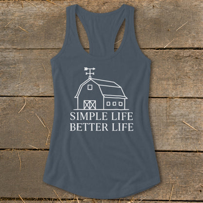 Dark grey racerback tank top with white barn graphic and text "SIMPLE LIFE BETTER LIFE".