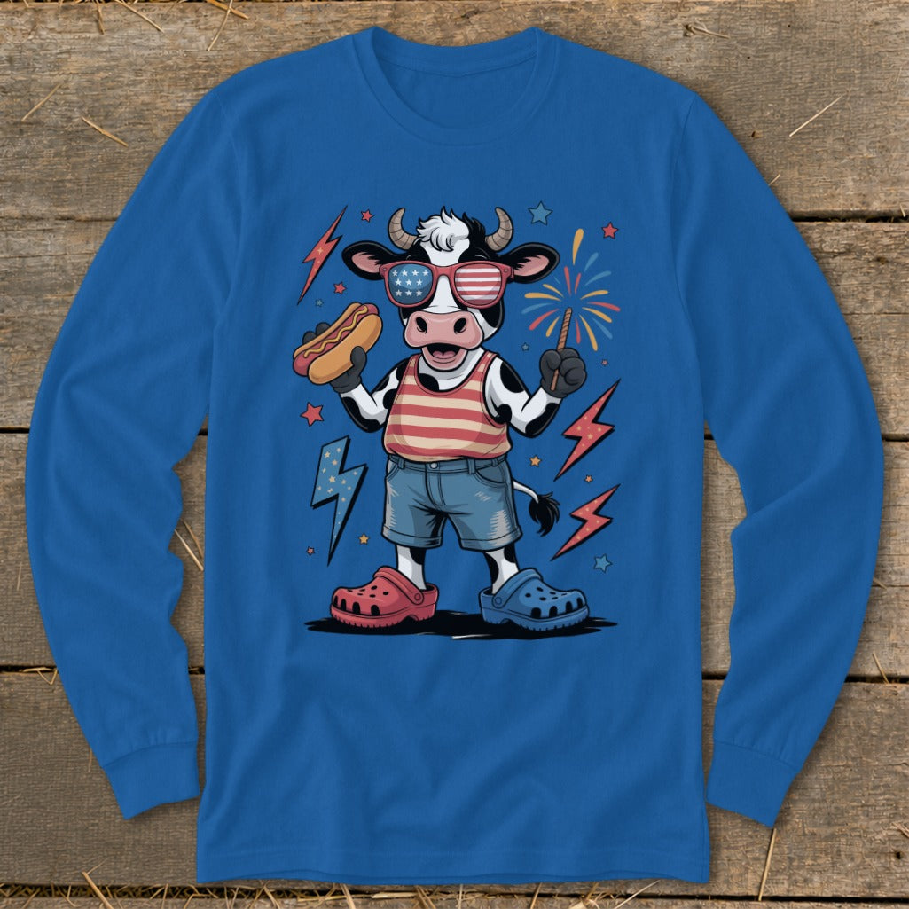 Cartoon cow in sunglasses holding hot dog, with fireworks and lightning bolts.