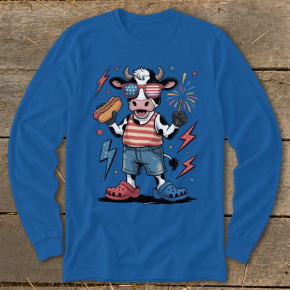 Cartoon cow in sunglasses holding hot dog, with fireworks and lightning bolts.