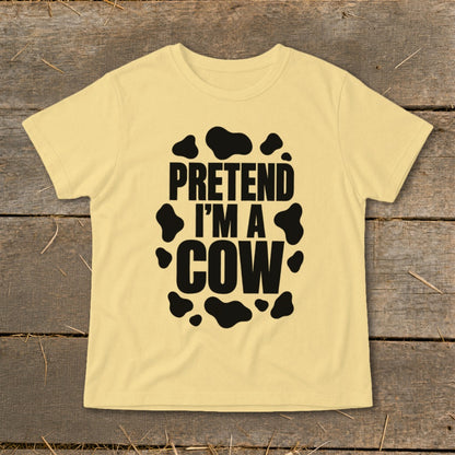Yellow t-shirt with "PRETEND I'M A COW" text and black cow spots.