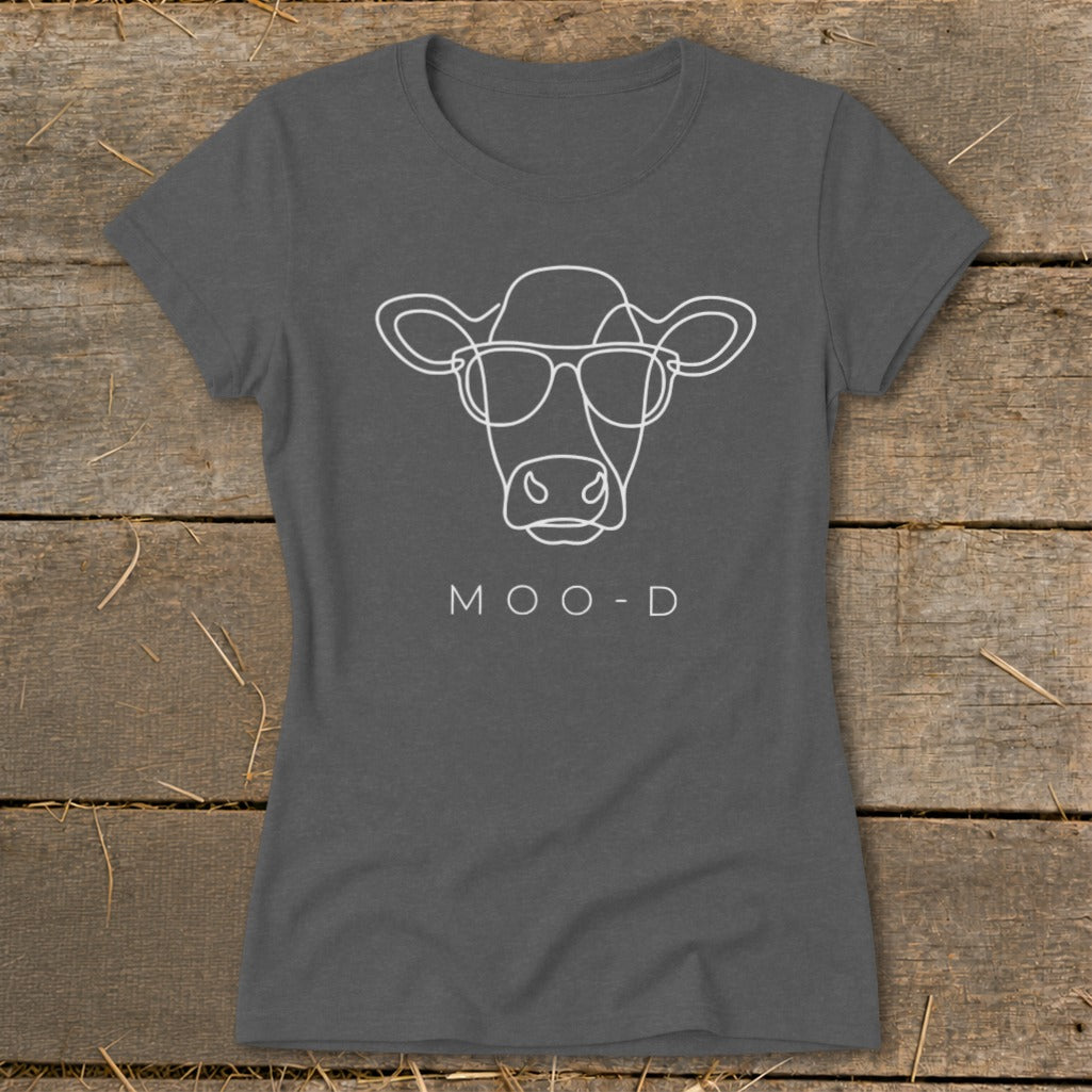 Dark gray t-shirt with a white line drawing of a cow wearing sunglasses and the text MOO-D.