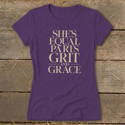 Purple t-shirt with "She's Equal Parts Grit And Grace" text in tan.