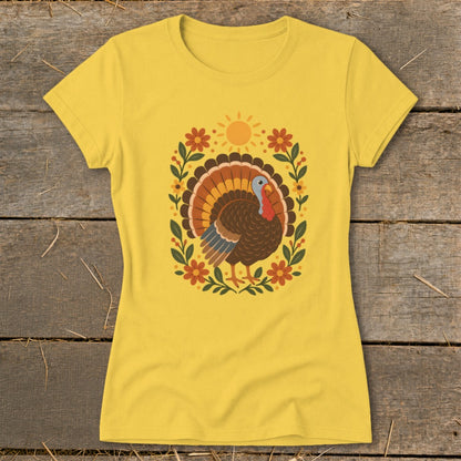 Yellow t-shirt with a Thanksgiving turkey and floral wreath graphic.