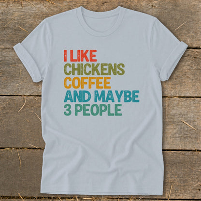 Light blue t-shirt with text: I LIKE CHICKENS COFFEE AND MAYBE 3 PEOPLE
