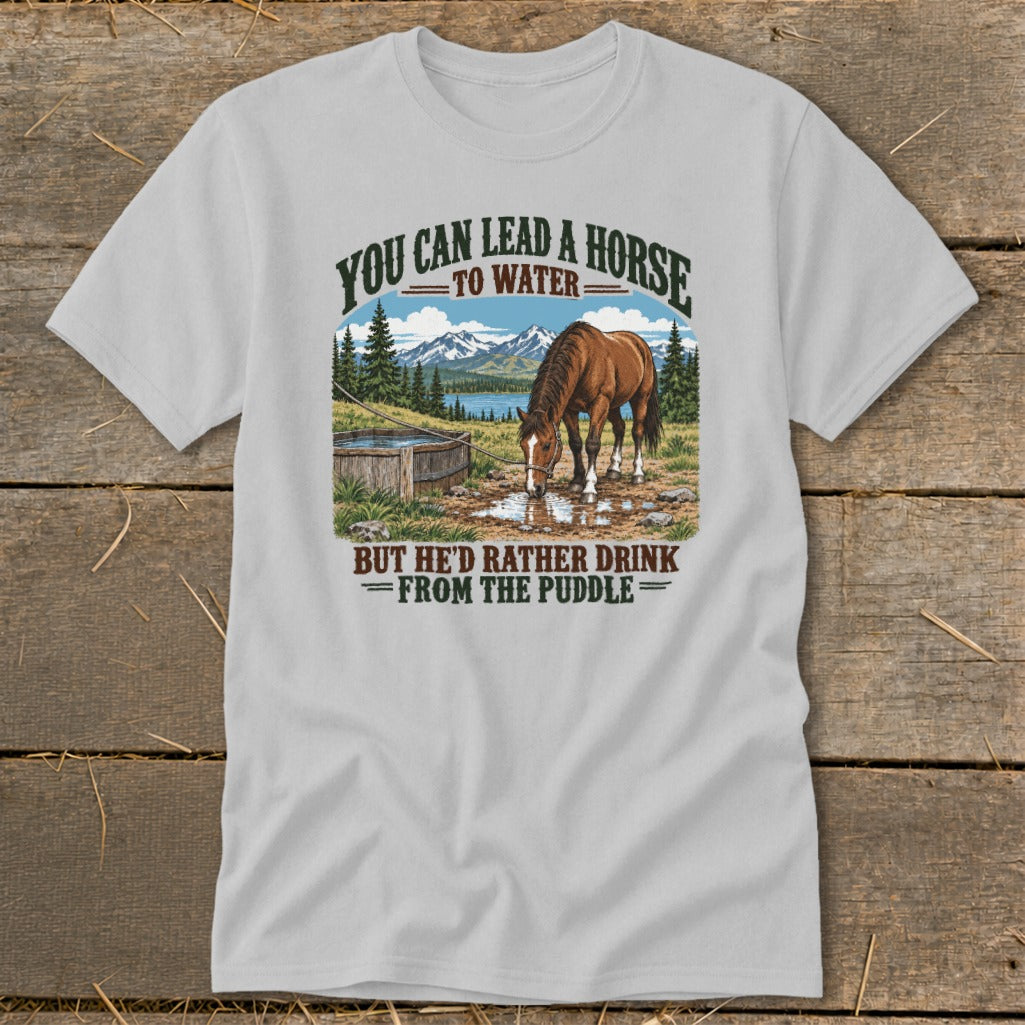 Light gray t-shirt featuring a graphic of a horse drinking from a puddle with text.