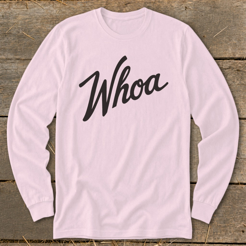 Pink long sleeve shirt with black "Whoa" text in a script font.