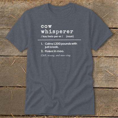 Gray t-shirt with "cow whisperer" definition: calms 1,200 pounds, fluent in moo.