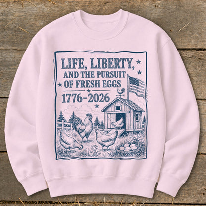 Life, Liberty, and the Pursuit of Fresh Eggs graphic with chickens, coop, and American flag.