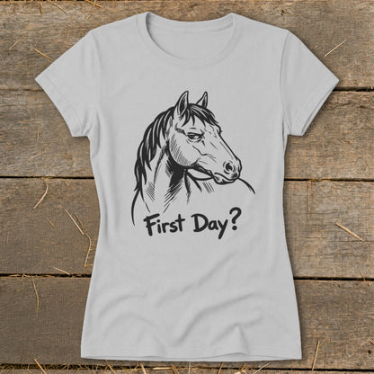Light grey t-shirt with a black line drawing of a horse's head and the text "First Day?".