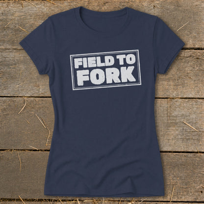 Navy blue short-sleeved t-shirt with a distressed white box graphic that reads FIELD TO FORK.