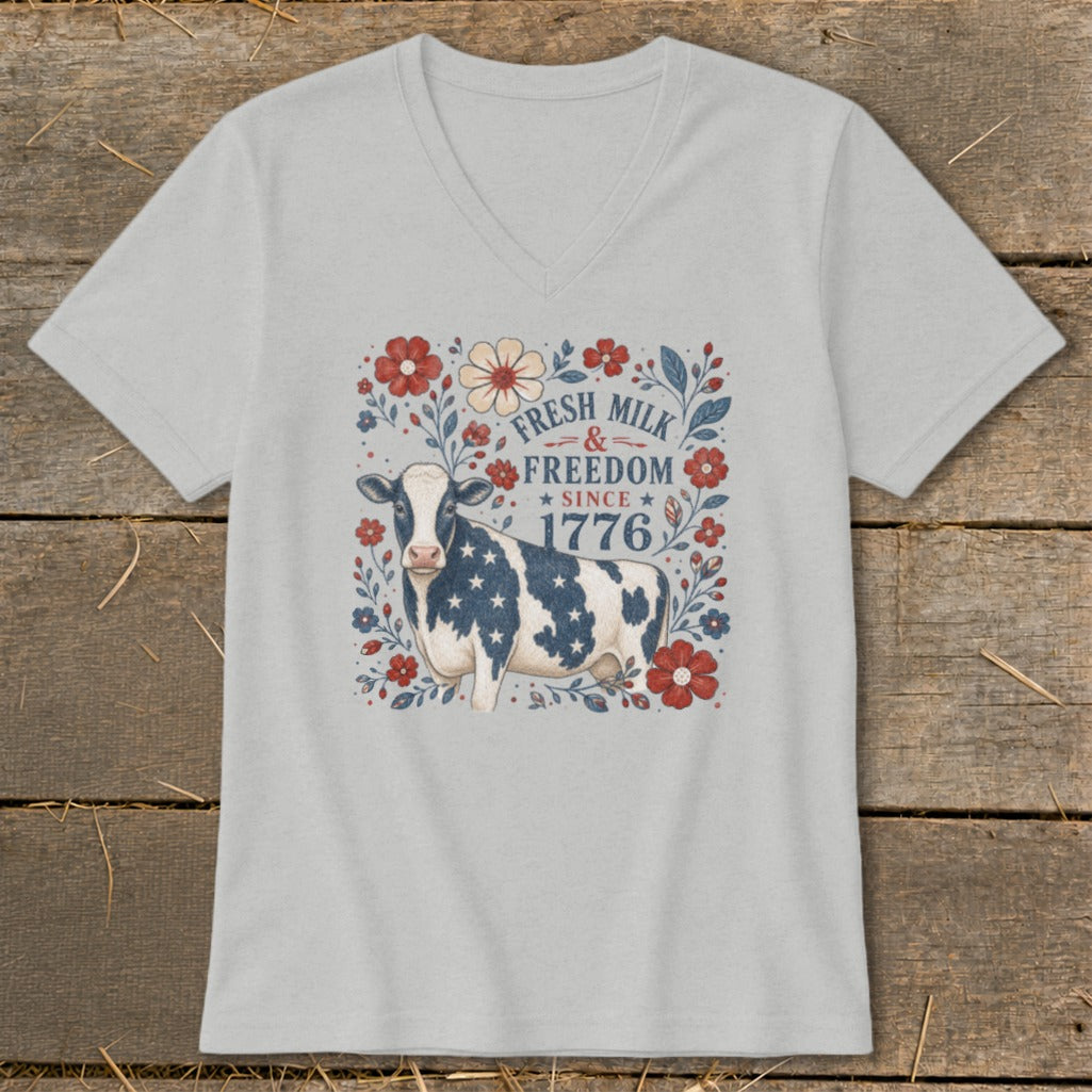 Cow with American flag pattern and floral design, "Fresh Milk & Freedom Since 1776" text.