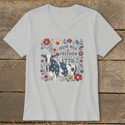 Cow with American flag pattern and floral design, "Fresh Milk & Freedom Since 1776" text.