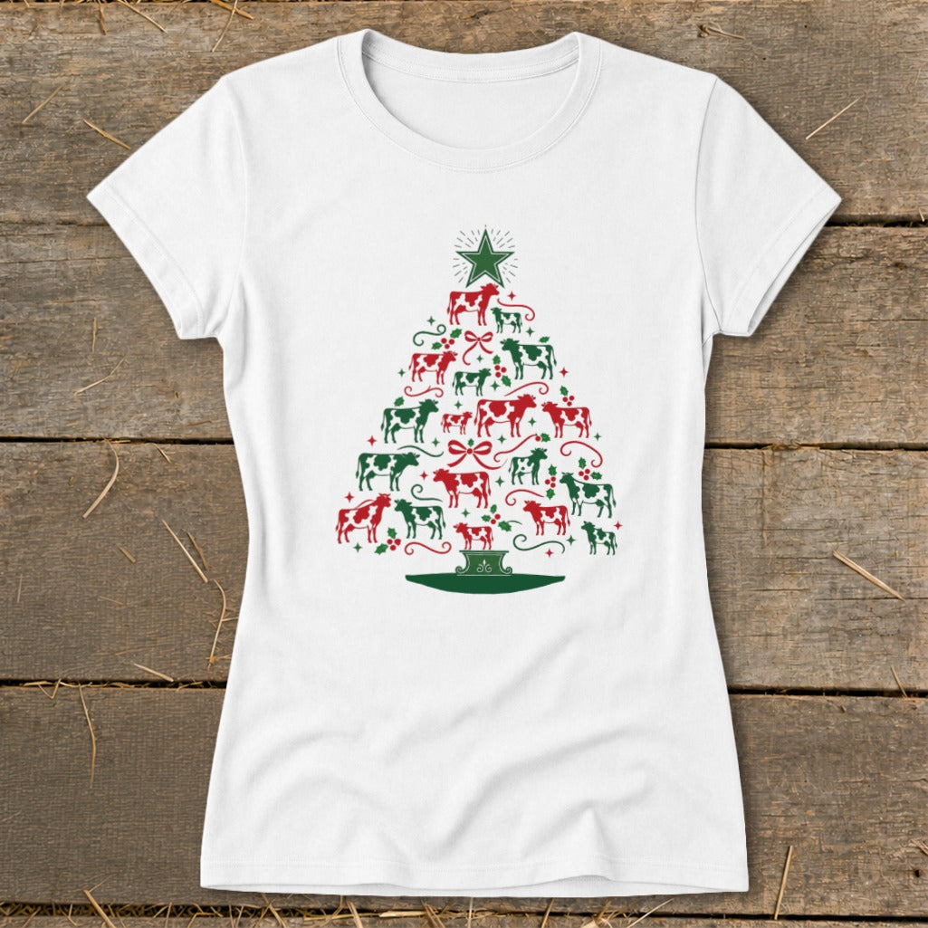 White t-shirt with a Christmas tree made of red and green cows.
