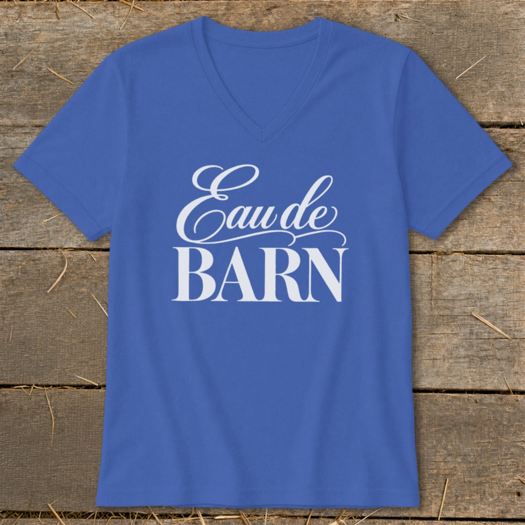 Blue V-neck t-shirt with "Eau de BARN" in white script and serif fonts.