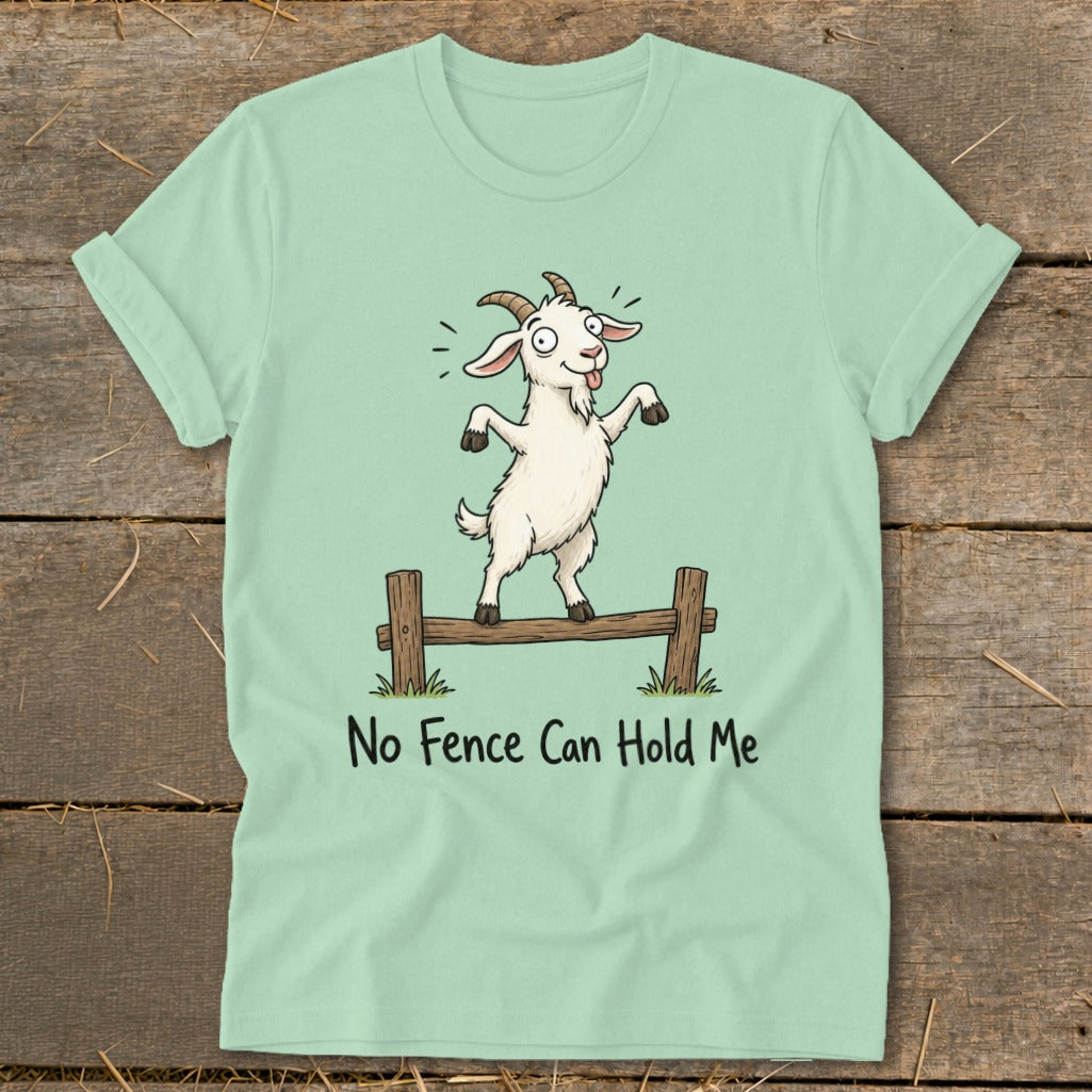 Light green t-shirt with cartoon goat standing on fence, text "No Fence Can Hold Me".