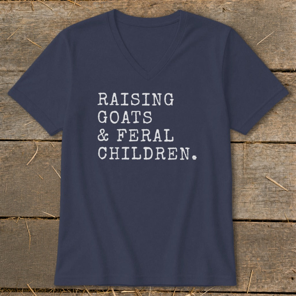 Navy v-neck t-shirt with white text "RAISING GOATS & FERAL CHILDREN."