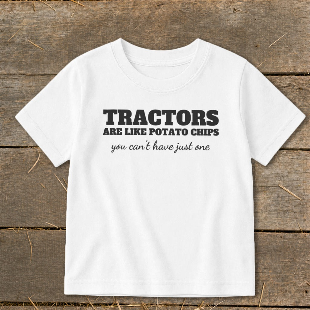 White t-shirt with text "TRACTORS ARE LIKE POTATO CHIPS you can't have just one."