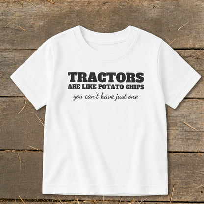 White t-shirt with text "TRACTORS ARE LIKE POTATO CHIPS you can't have just one."