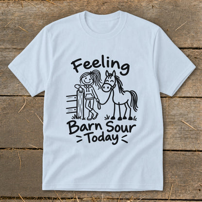Light blue t-shirt with "Feeling Barn Sour Today" text and a drawing of a girl with a horse.