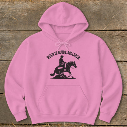 Pink hoodie with a black silhouette of a rider and horse and the text "WHEN IN DOUBT, ROLLBACK".