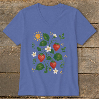 Blue v-neck t-shirt with a whimsical strawberry plant and sun design.