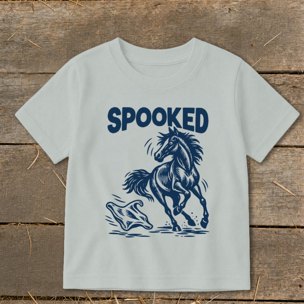 T-shirt with "SPOOKED" text and a startled horse with a ghost.
