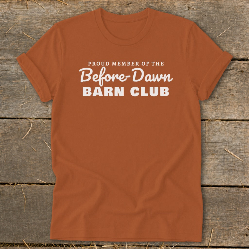 Orange t-shirt with white text: "Proud Member of the Before-Dawn Barn Club".