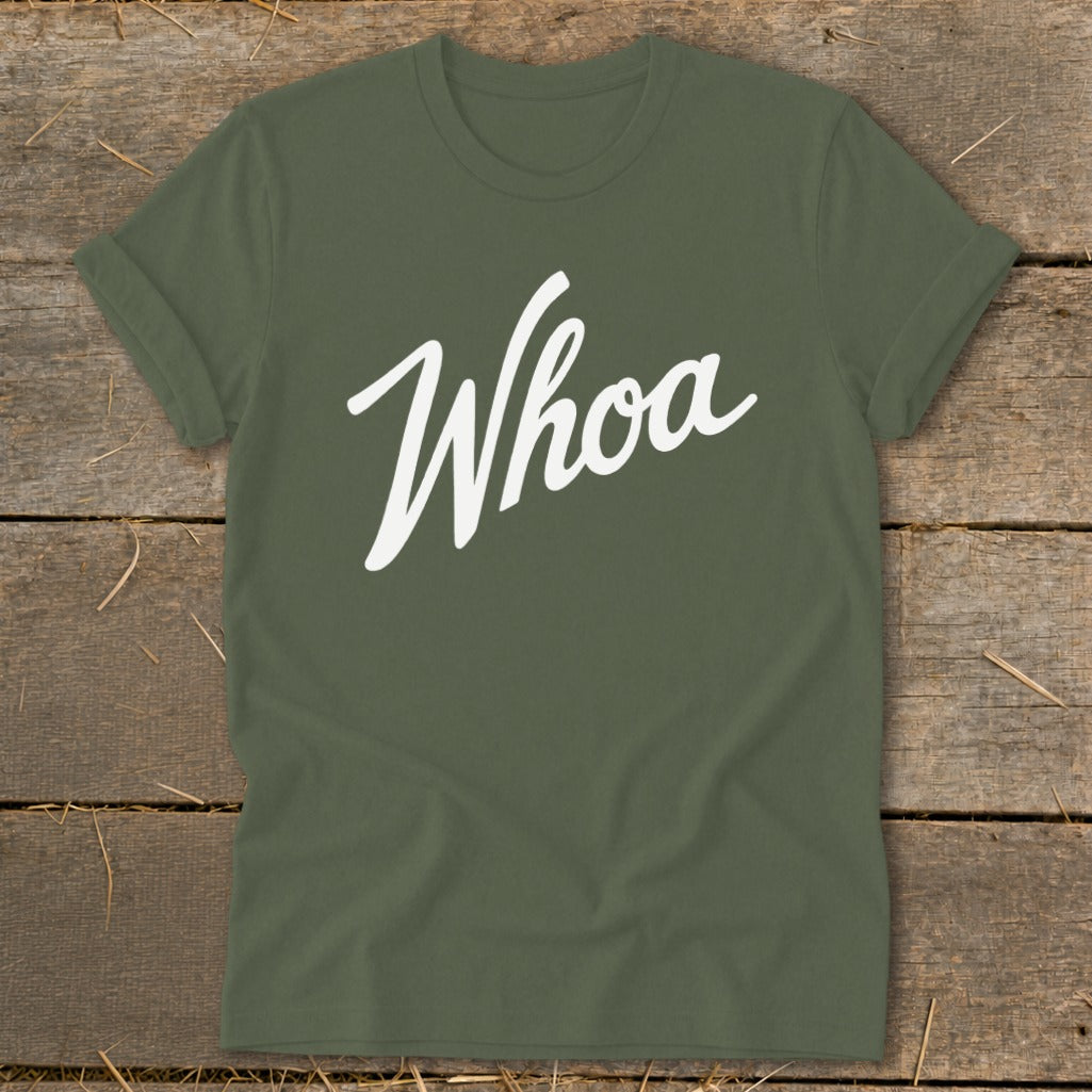 Olive green t-shirt with white "Whoa" text in script font