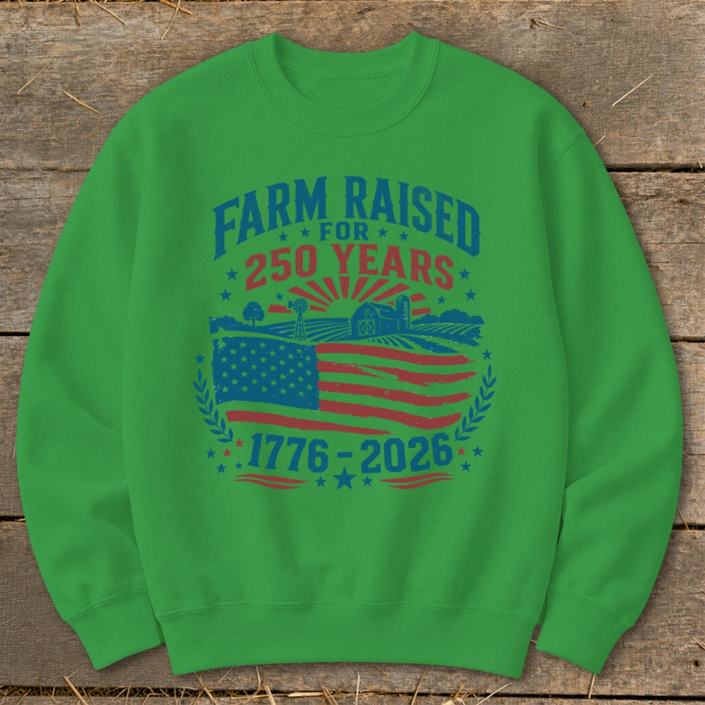 Green sweatshirt with "Farm Raised For 250 Years 1776-2026" text and flag.