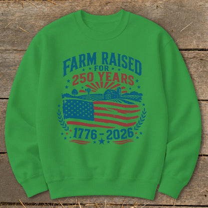 Green sweatshirt with "Farm Raised For 250 Years 1776-2026" text and flag.