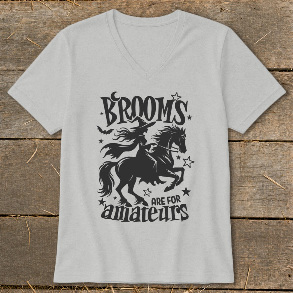 Black silhouette of a witch riding a horse with text "BROOM'S ARE FOR amateurs".