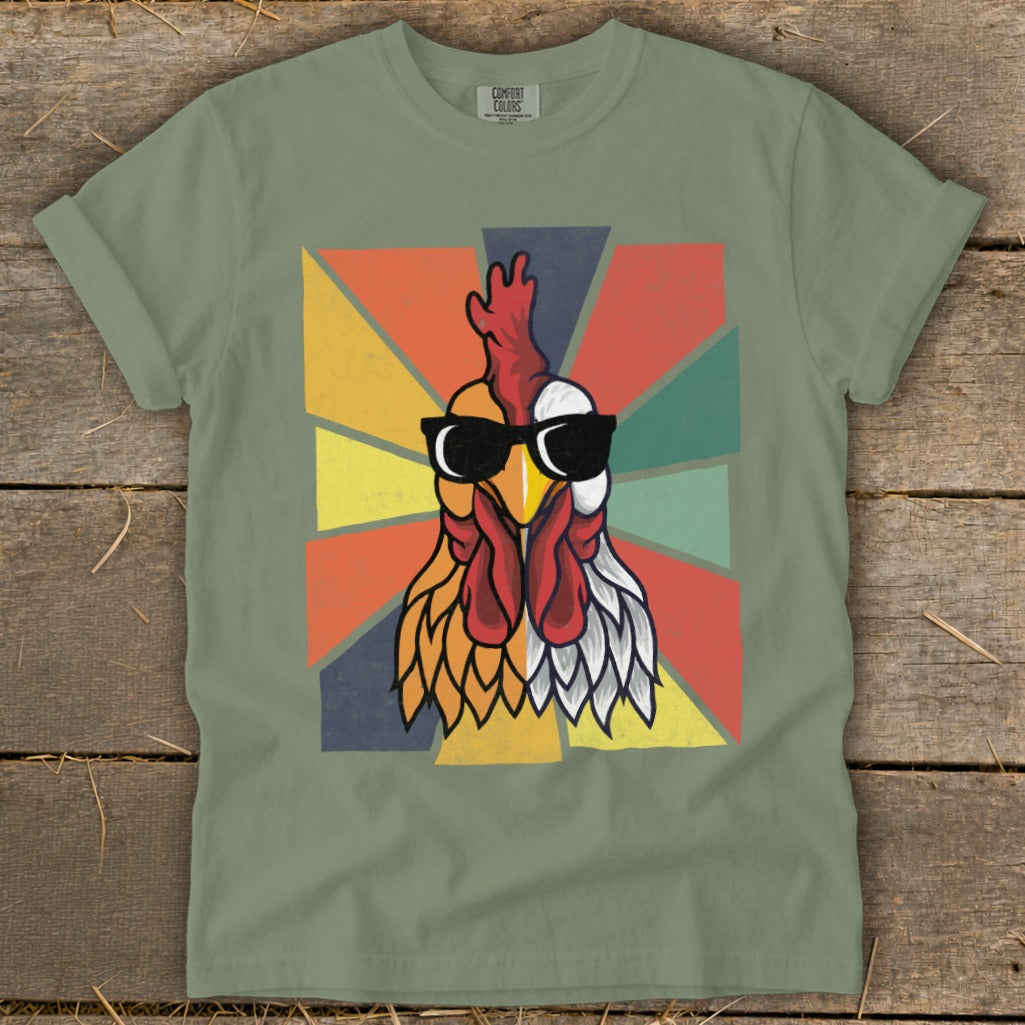 Cool rooster wearing sunglasses on a colorful retro background.