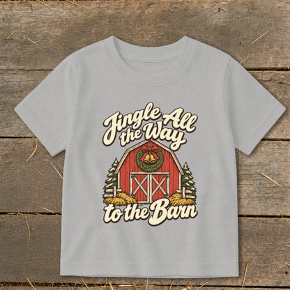 Grey t-shirt with a red barn, Christmas wreath, bells, and text "Jingle All the Way to the Barn".