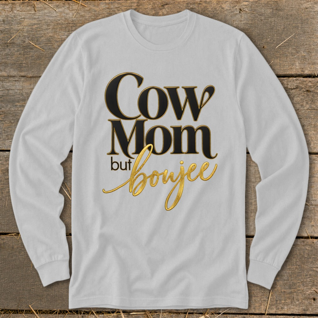 White long-sleeve shirt with "Cow Mom but boujee" text in black and gold.