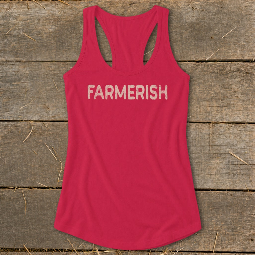 Pink racerback tank top with distressed "FARMERISH" text.