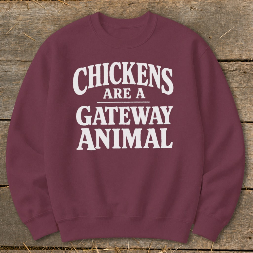 Maroon sweatshirt with white text that reads "Chickens Are a Gateway Animal".