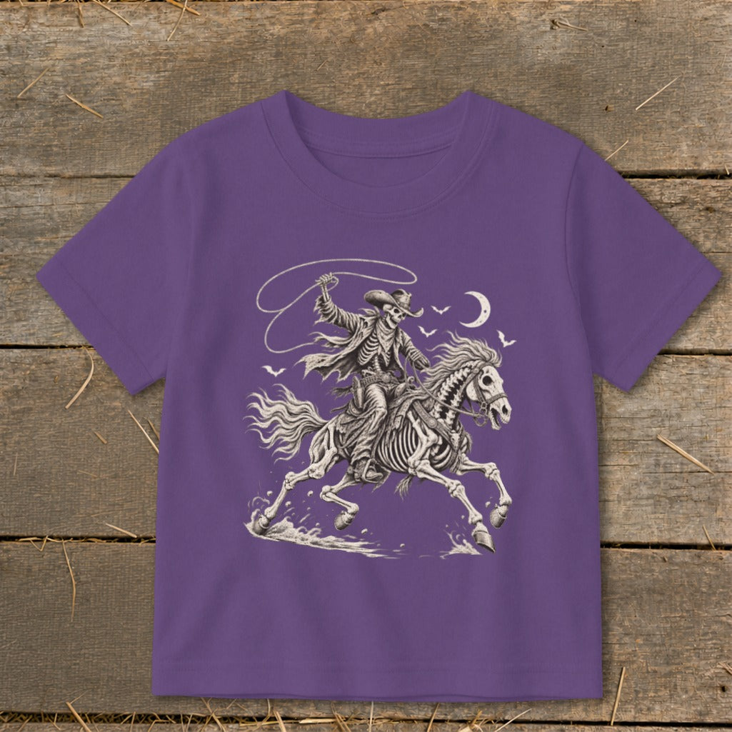 Skeleton cowboy on horseback with a lasso under a crescent moon.