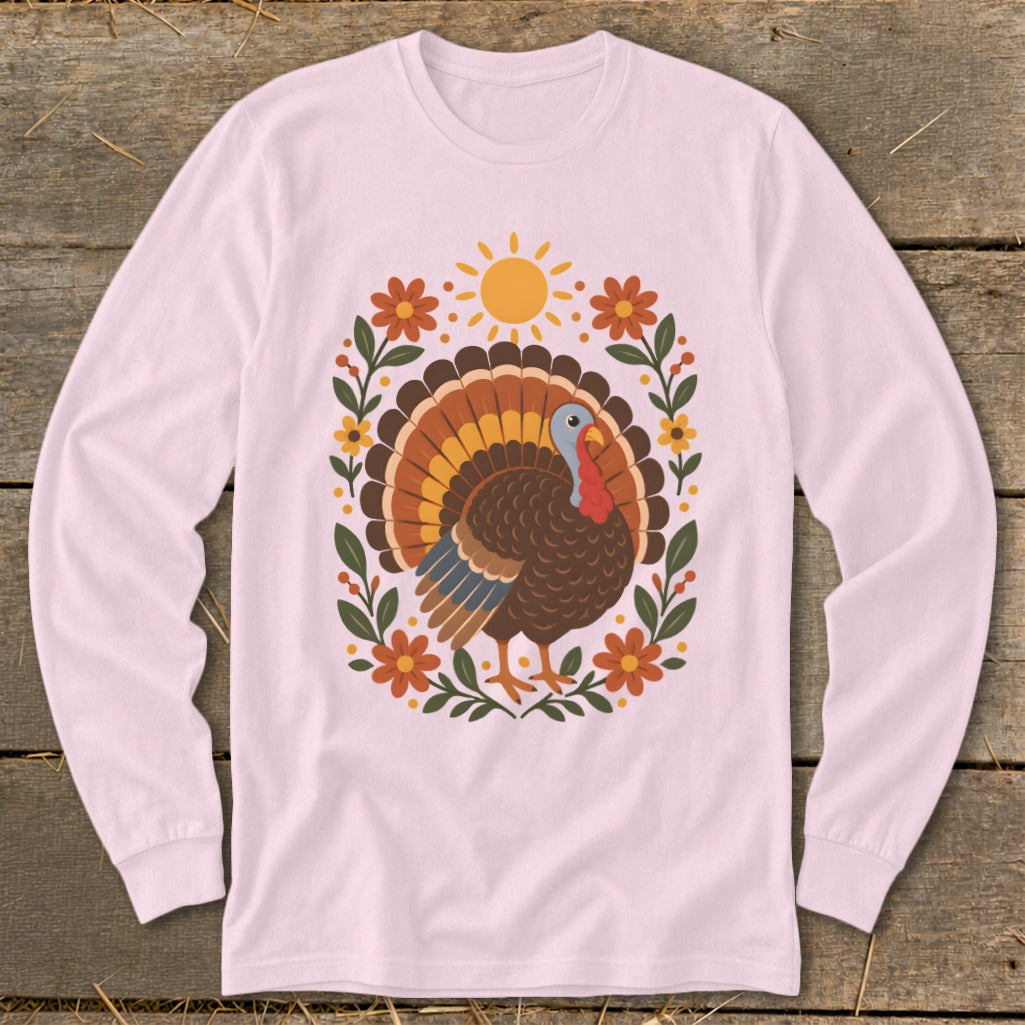 Pink long sleeve shirt with a stylized turkey and floral border design.