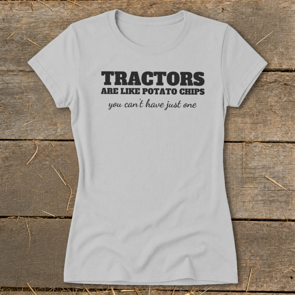 Light grey t-shirt with "Tractors are like potato chips, you can't have just one."