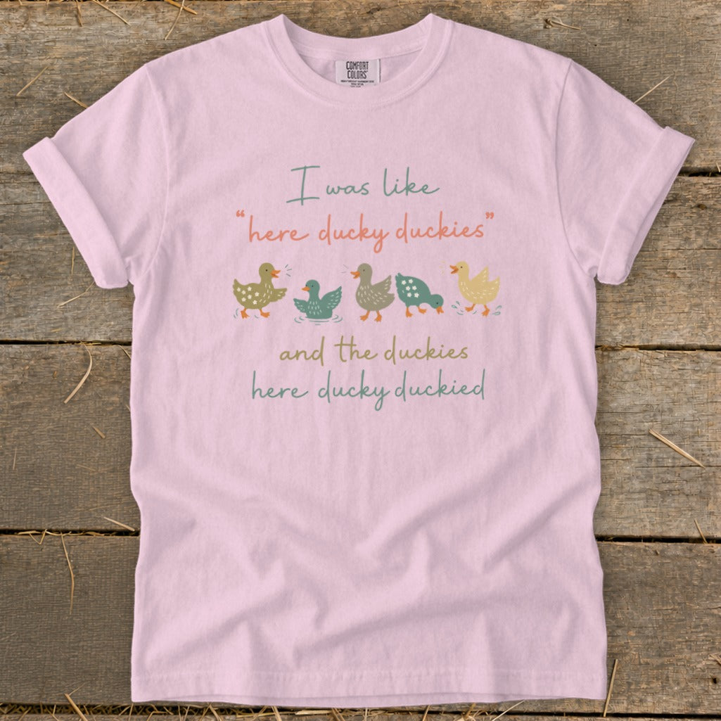 Comfort Colors light pink t-shirt with ducks and text "I was like 'here ducky duckies' and the duckies here ducky duckied".