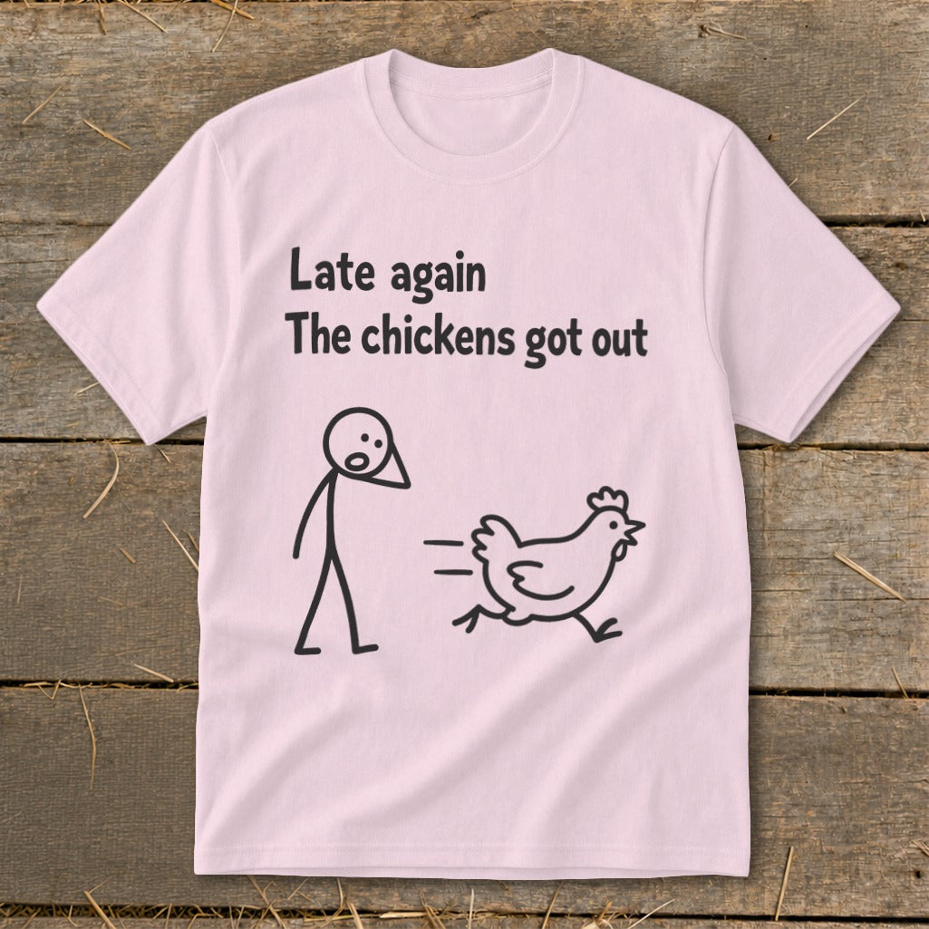 Pink t-shirt with "Late again the chickens got out" text and stick figure chasing a chicken.