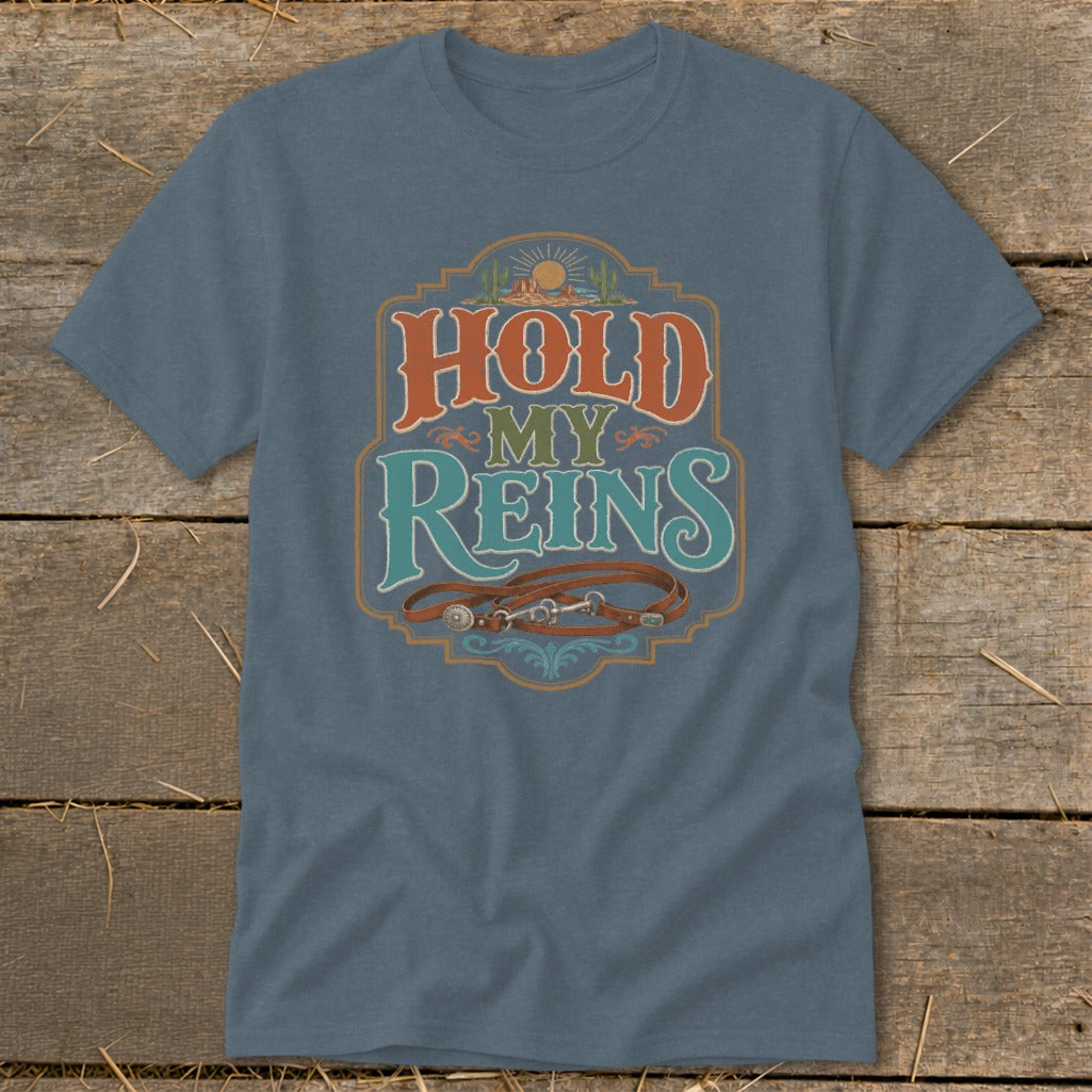 Blue t-shirt with "Hold My Reins" text and horse reins illustration.