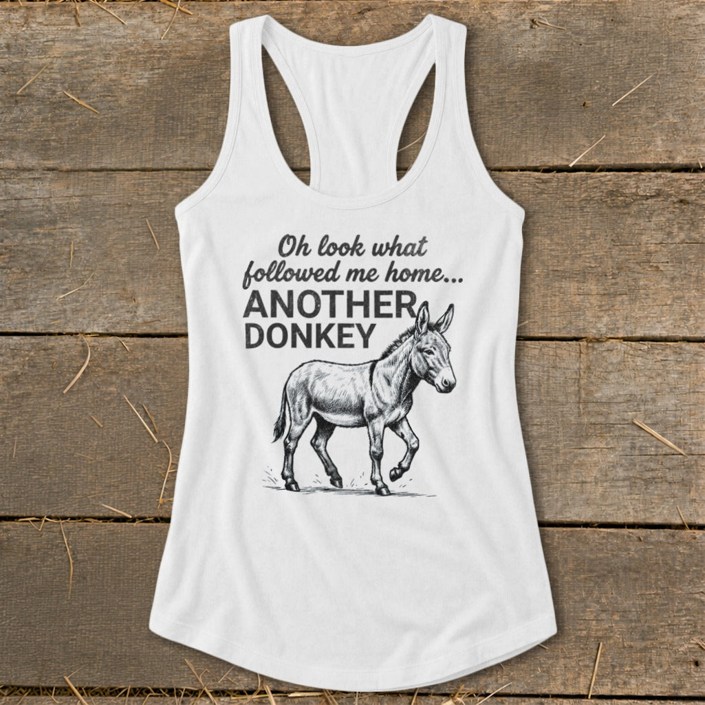 White tank top with sketch of donkey and text "Oh look what followed me home... ANOTHER DONKEY".