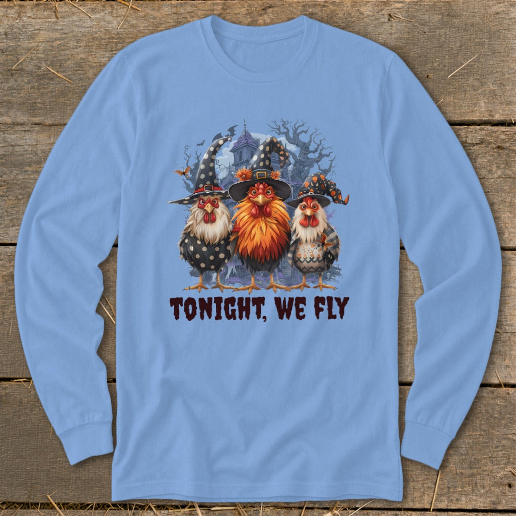 Three witch-hatted chickens stand before a spooky house, with the text "TONIGHT, WE FLY".